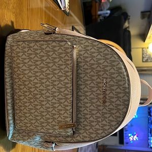 Michael Kors bag and matching wallet.  Good condition.